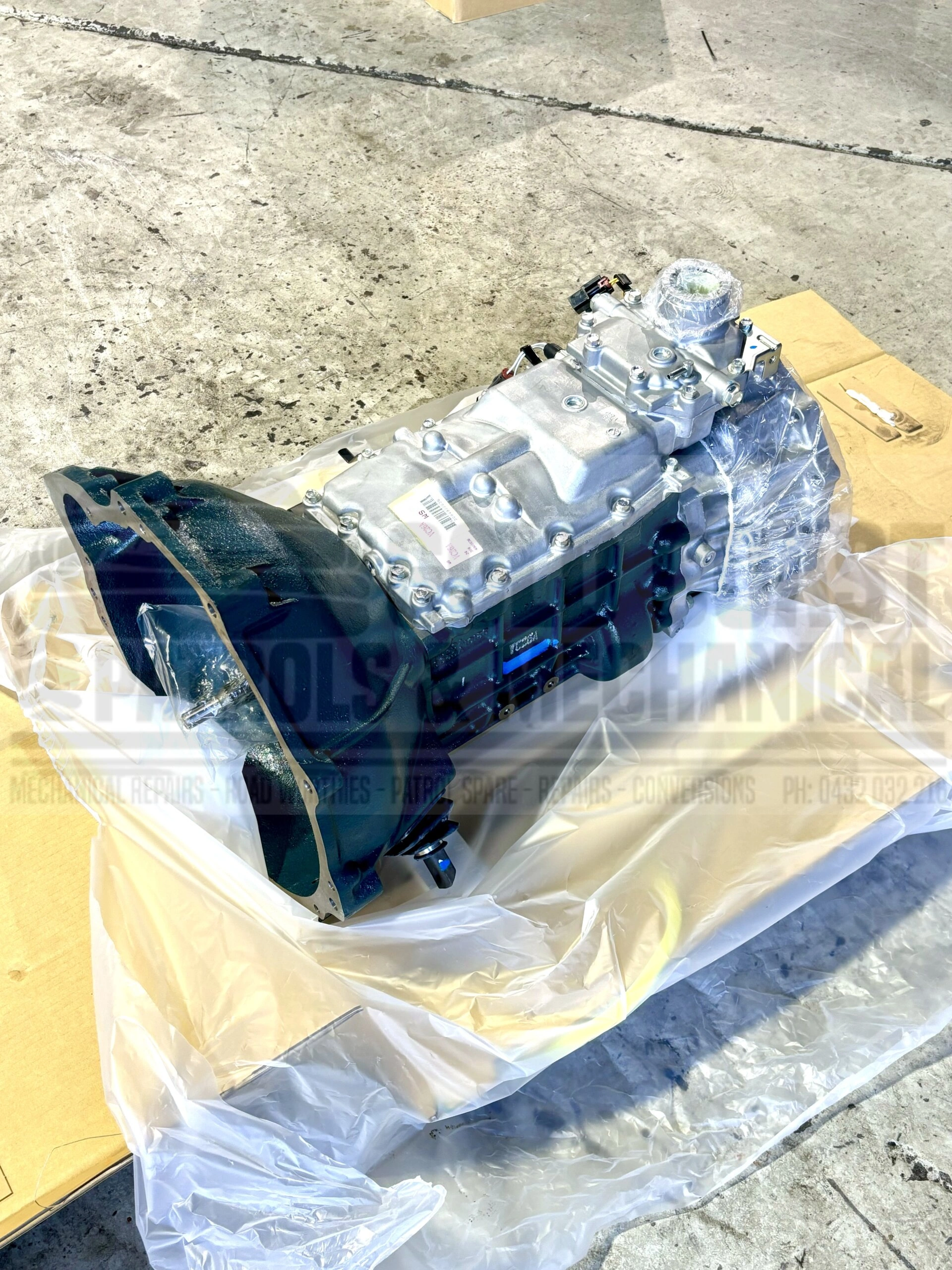Коробка передач в сборе с валом